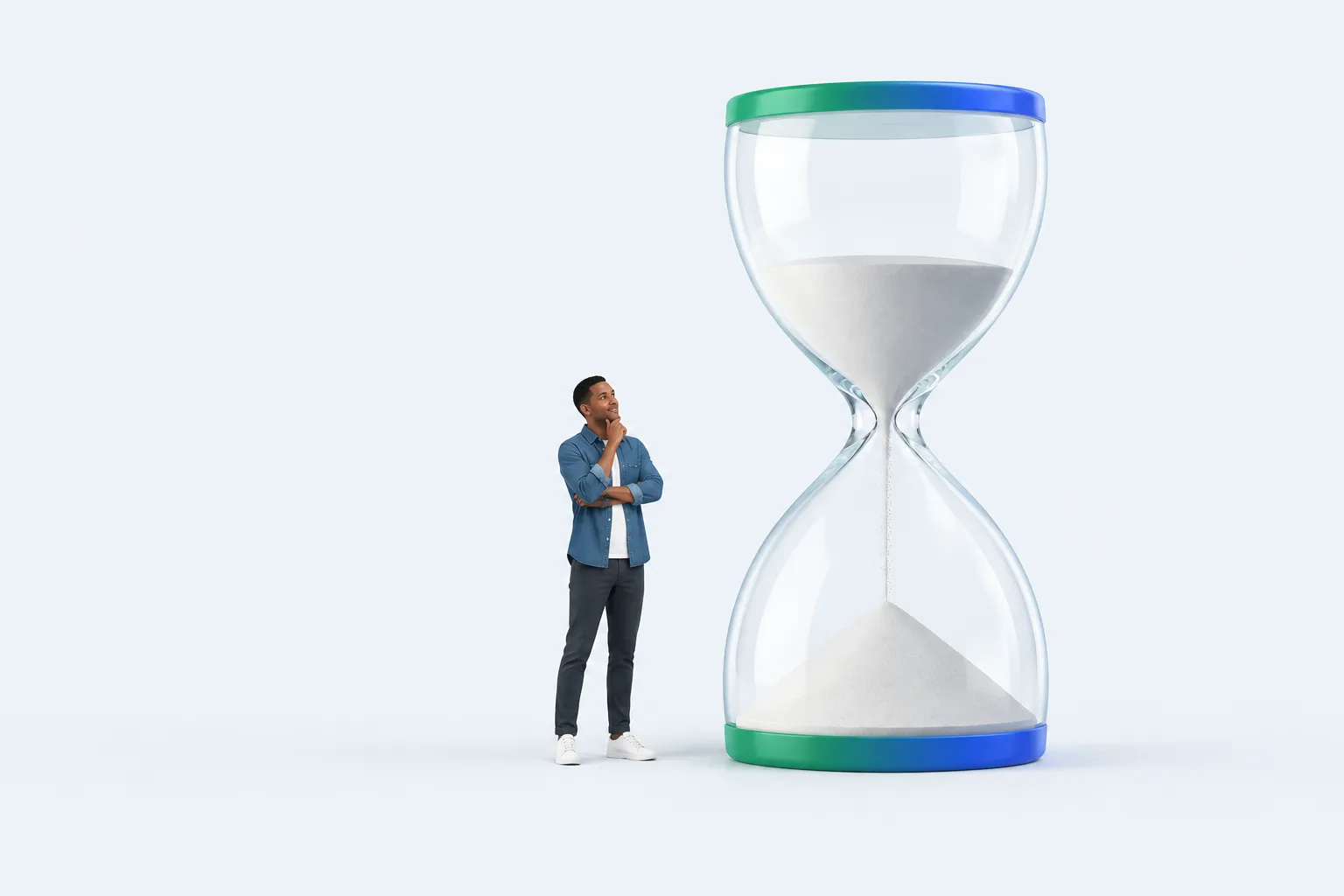 A small figure stands beside an oversized glass hourglass, representing a time-boxed first draft.